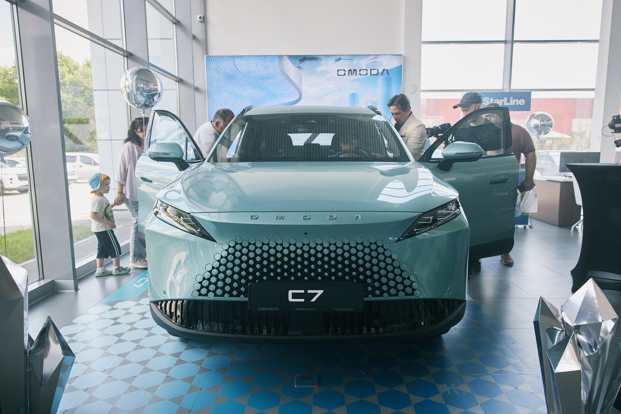Фотоотчет с Презентации новой модели OMODA C7